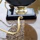 Pair of 70s designer lamps in black ceramic and gold metal