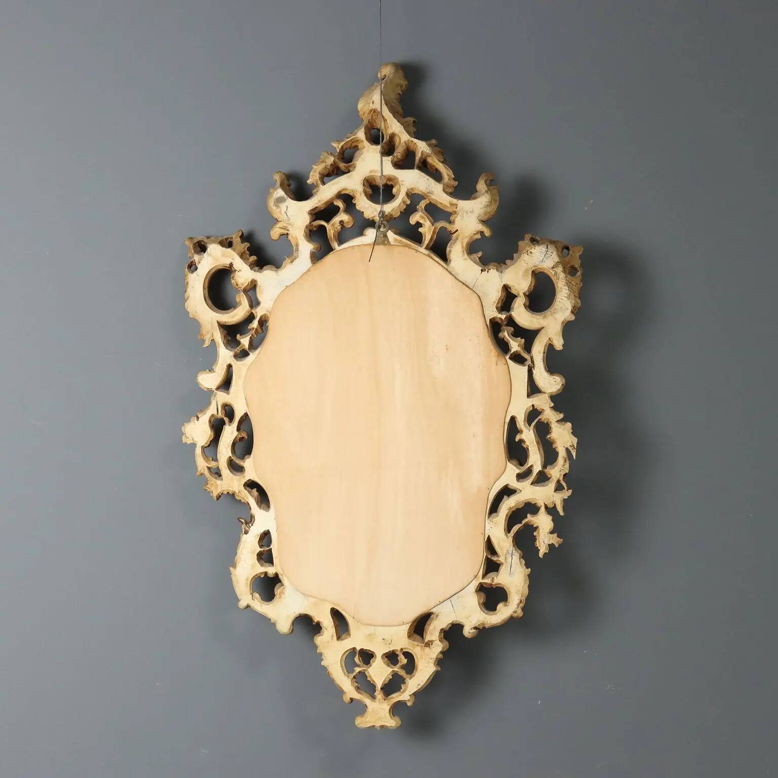 Antique lacquered and gilded wooden mirror, Italy, early 20th century.