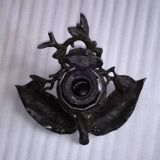 Old office ink bottle in regular art nouveau foliage