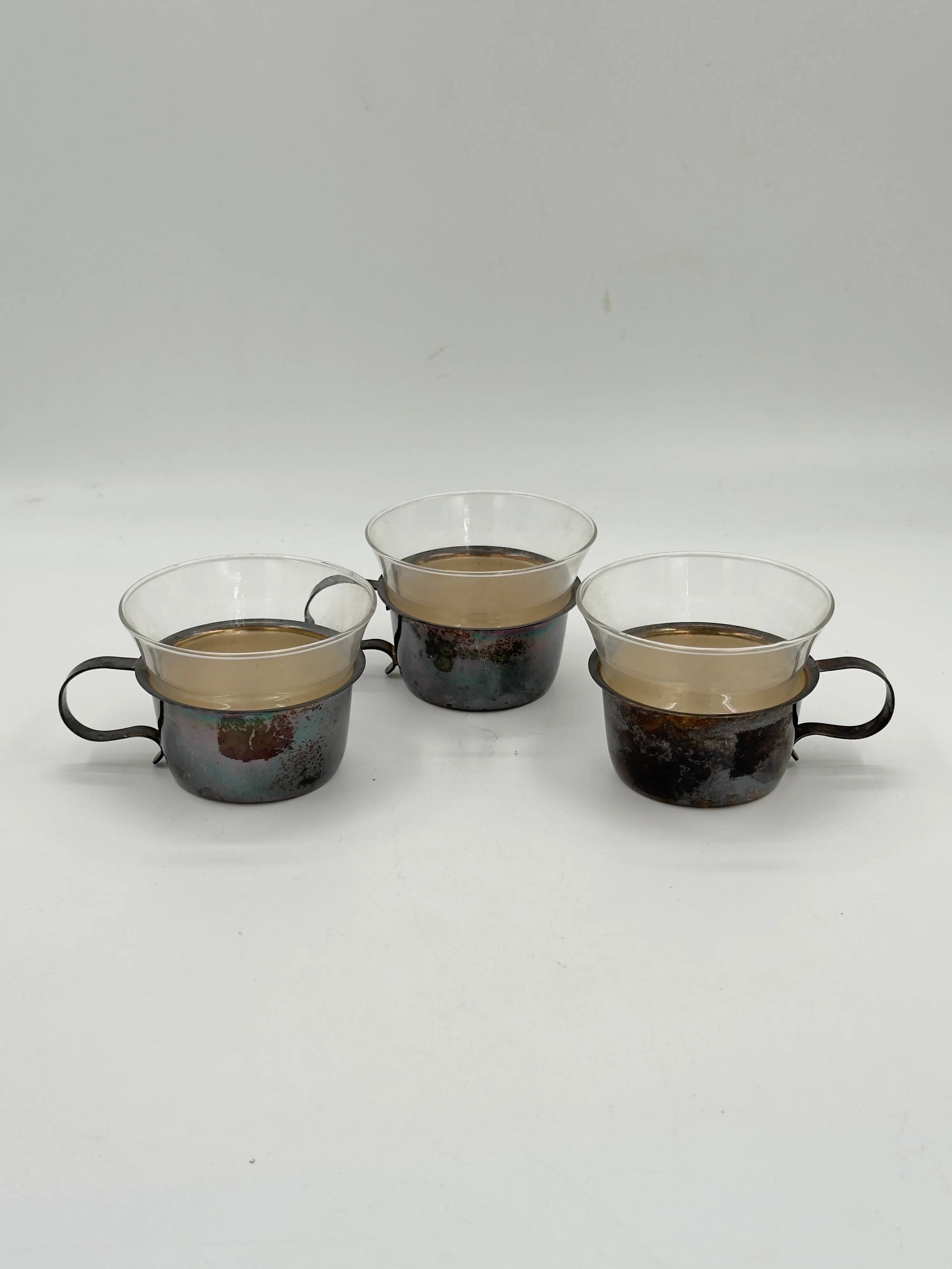 Set of 3 vintage tea glasses with silver-plated holders.