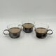 Set of 3 vintage tea glasses with silver-plated holders.