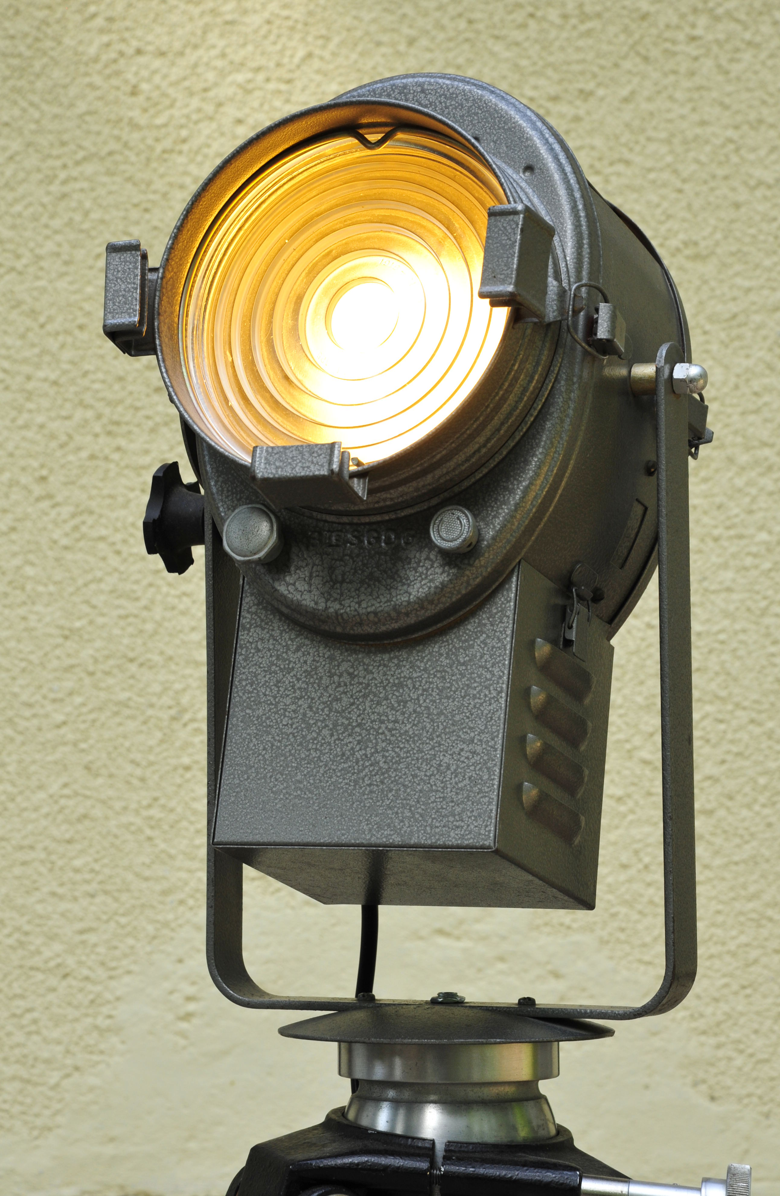 Cremer cinema projector on wooden tripod
