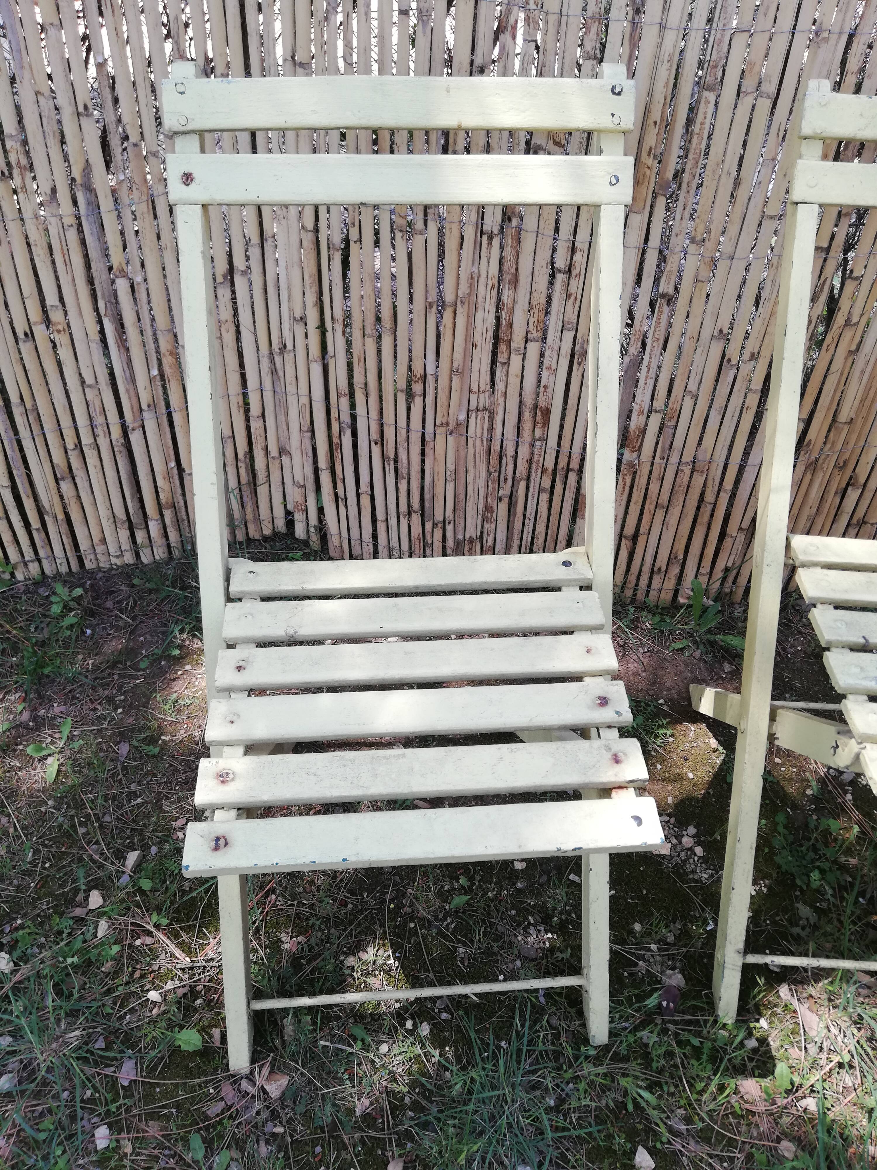 Two folding garden chairs