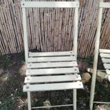 Two folding garden chairs