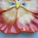 Decorative plate in earthenware dabbling: Orange thought with a yellow heart