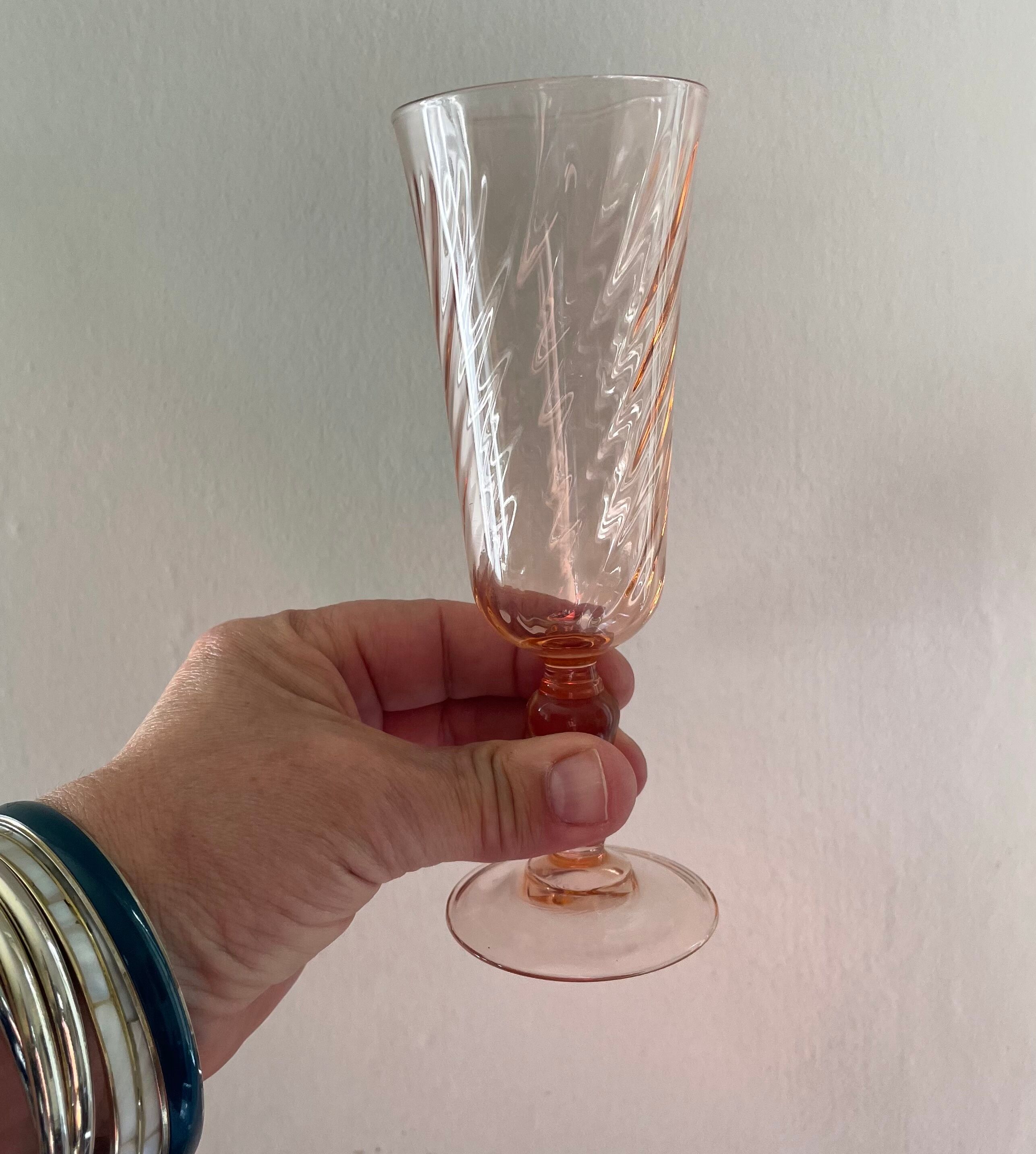 Pink glass champagne flutes from Arcoroc Luminarc model Rosaline