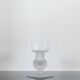 Sculptural candle holder in frosted glass.