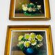 Pair of small framed vintage floral oils