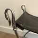Curule stool in silver steel neoclassical style with swan heads
