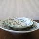 LIMOGES "Parsifal" 2 empty shell-shaped bowls decorated with birds Bernardaud & Co.