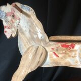 Cheval à bascule avec roulettes