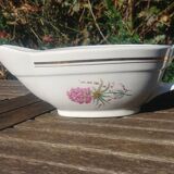 Porcelain gravy boat from the Orchies Moulin des Loups earthenware factory with lilac decoration