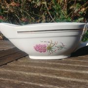 Porcelain gravy boat from the Orchies Moulin des Loups earthenware factory with lilac decoration