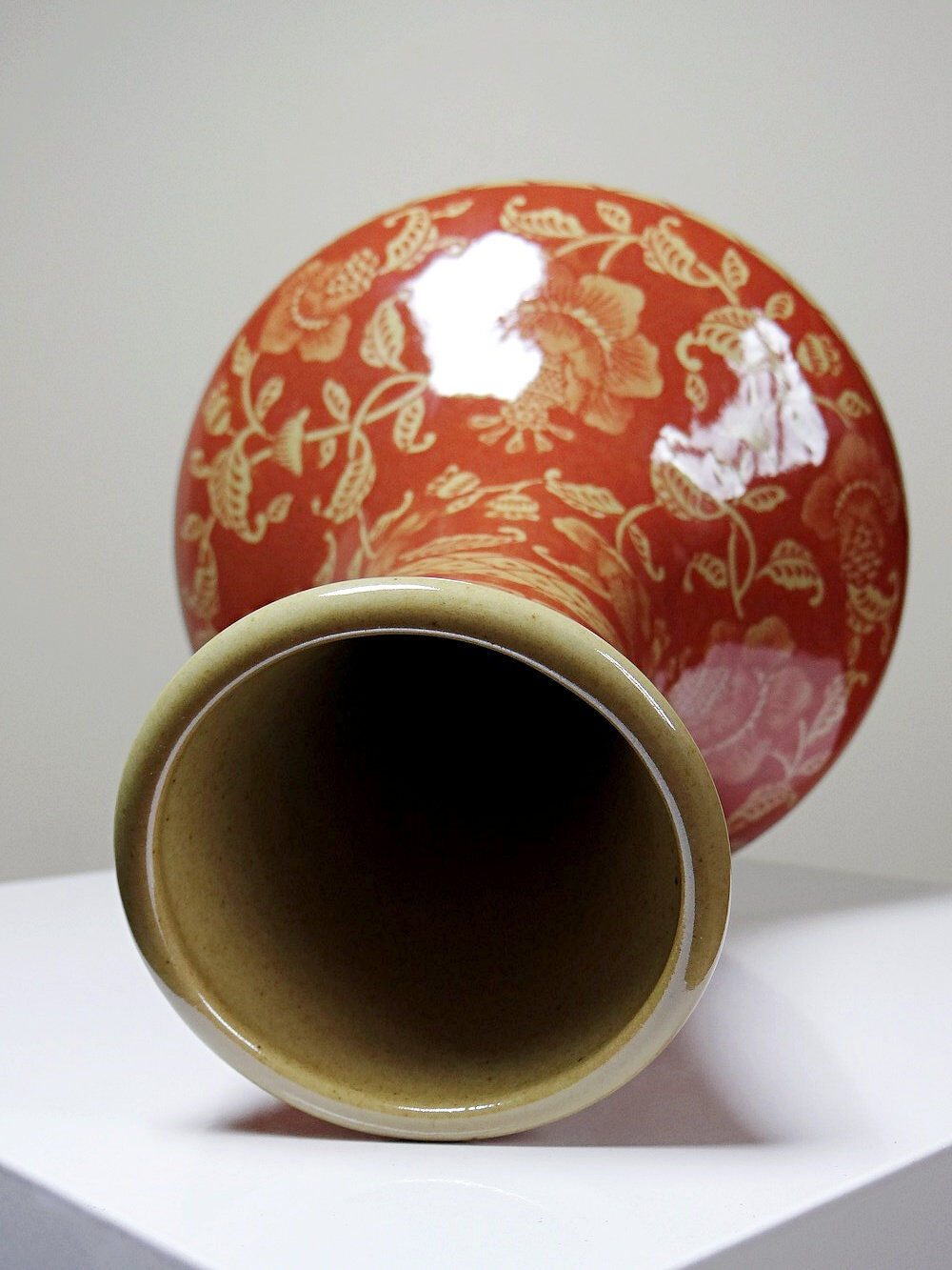 20th century Chinese vase, hand-painted ceramic in an unusual red hue.