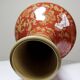 20th century Chinese vase, hand-painted ceramic in an unusual red hue.