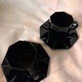 Set of 2 arcoroc black glass coffee cups with underplates