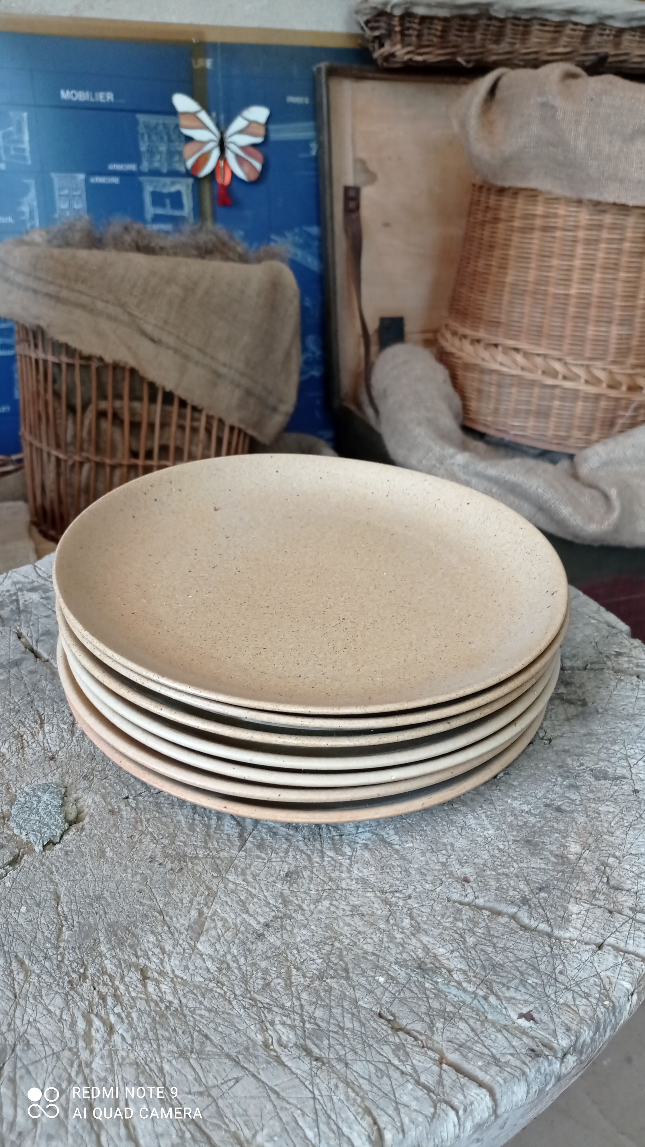 Set of seven plates in sandstone