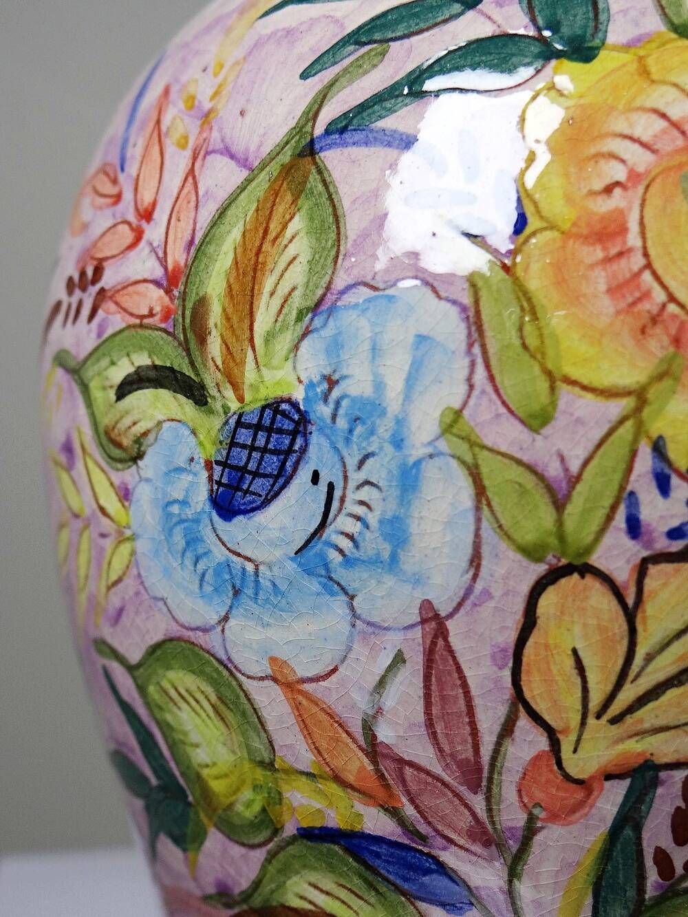 Vintage Portuguese vase in glazed terracotta with hand-painted floral decoration.