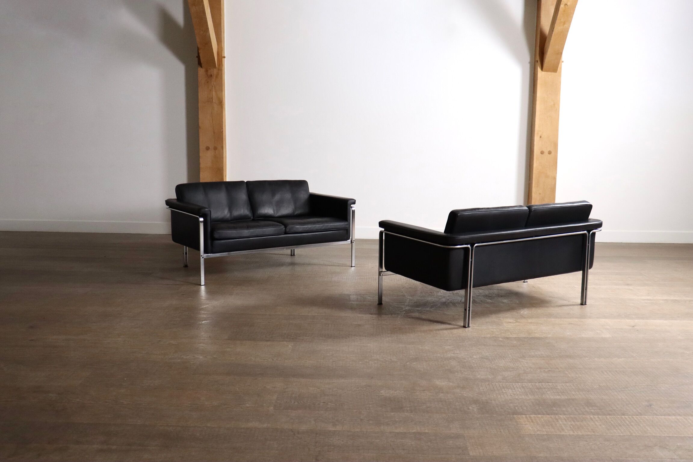 Horst Brüning Model 6912 two seater sofa in black leather for Kill International, Germany 1967