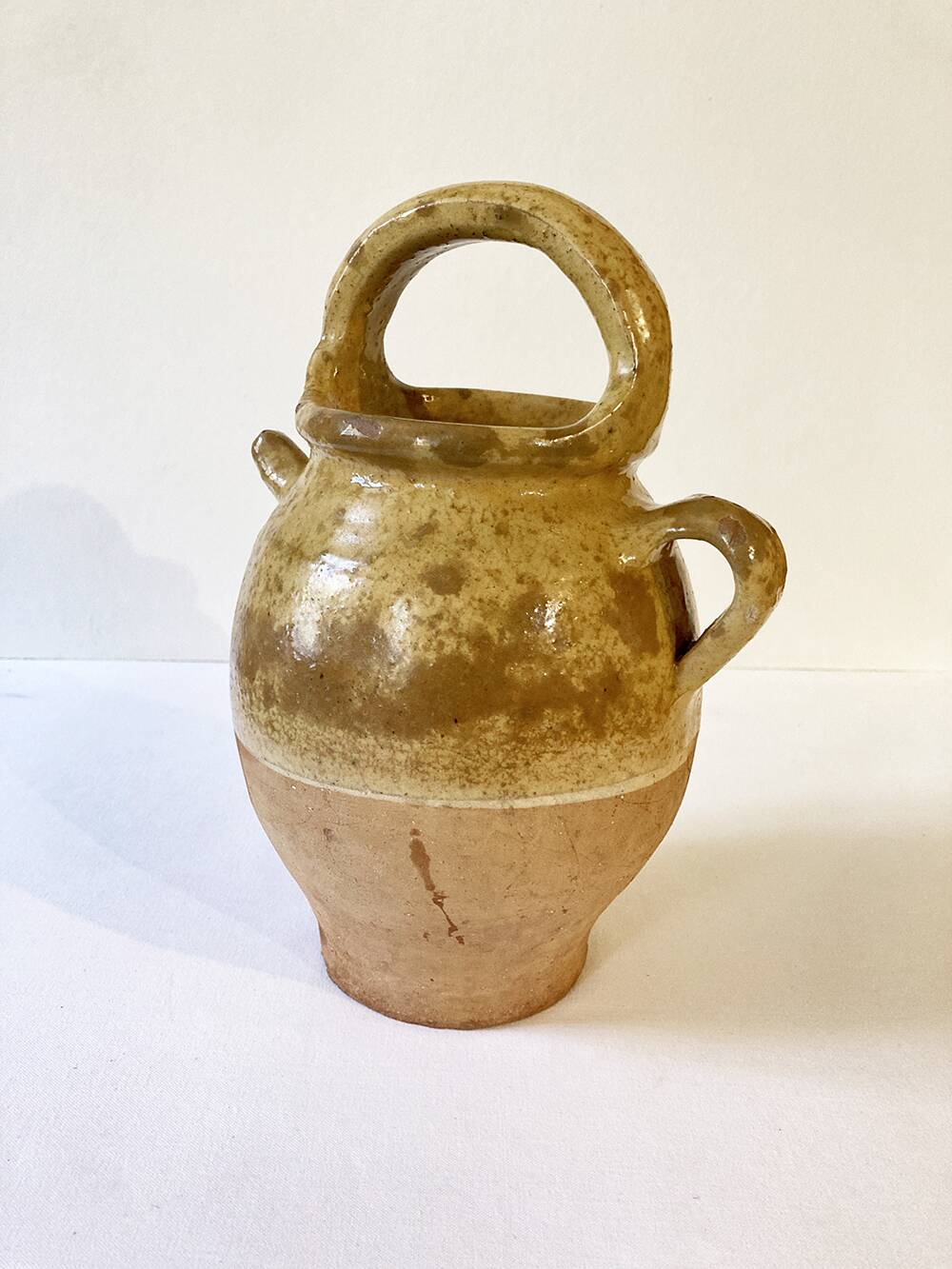 Antique Provençal jug / goat in yellow enamelled stoneware