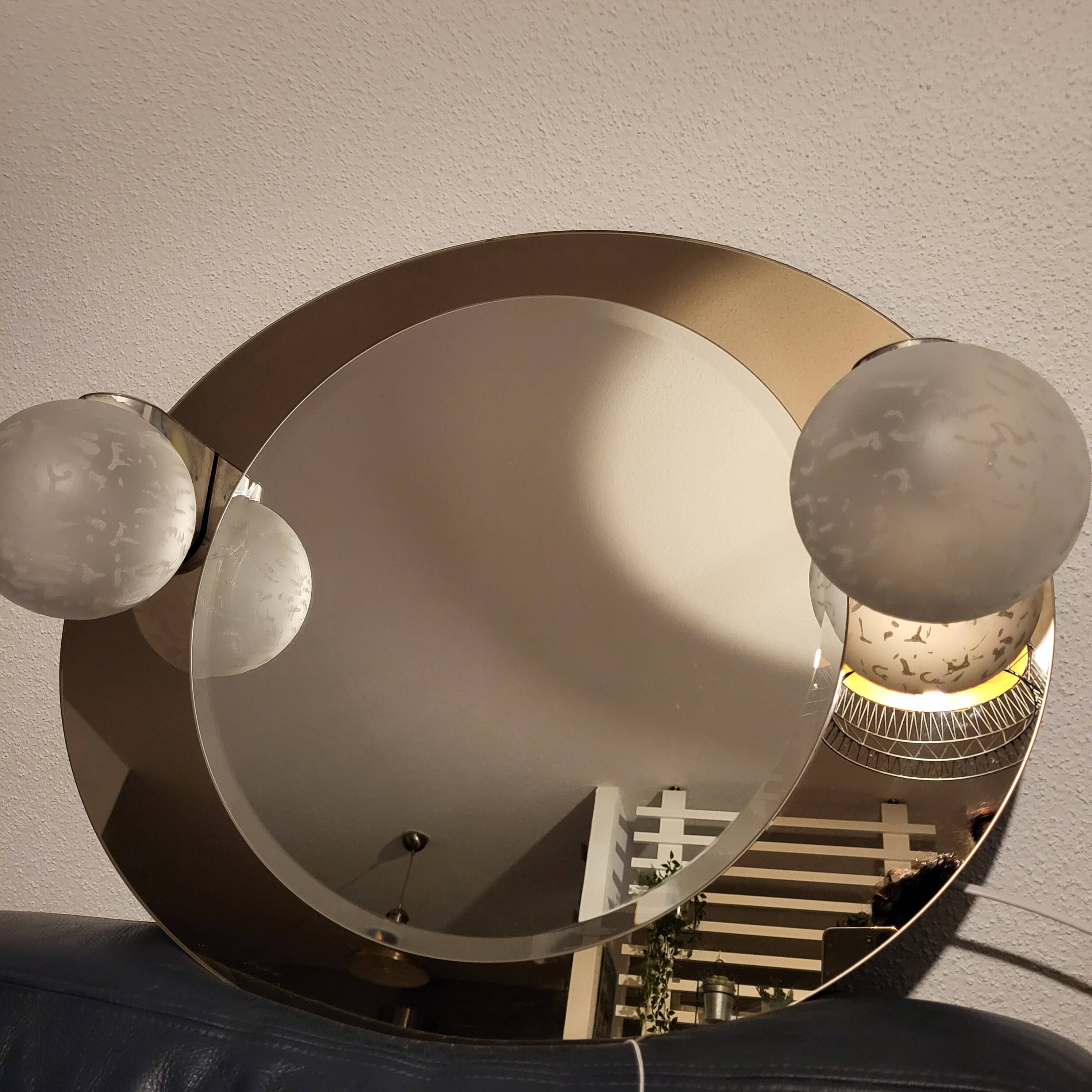 Smoked oval mirror, Italy, 1970