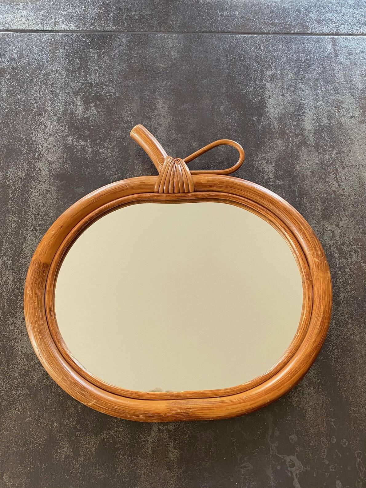 Vintage rattan apple mirror