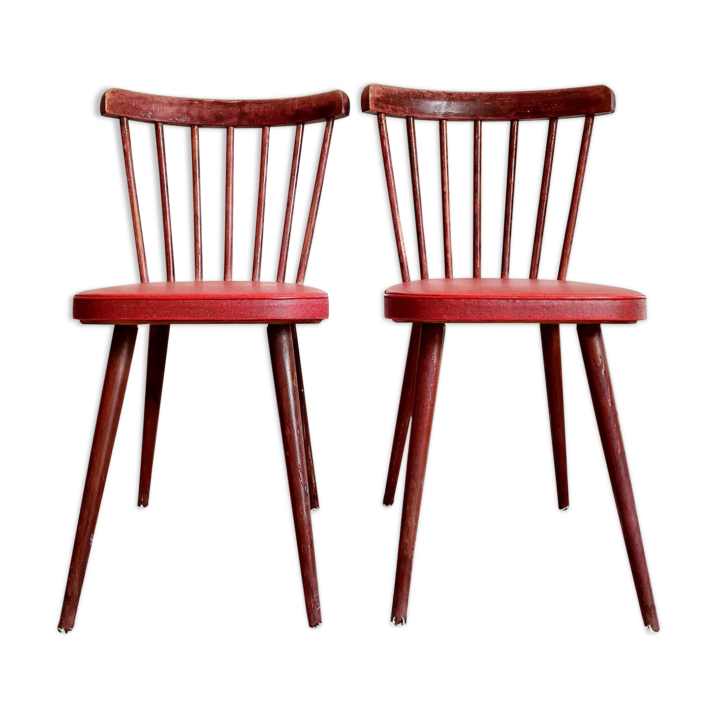 Pair of wooden bistro chairs and red imitation seating