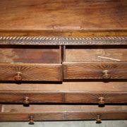 19th-century Anglo-Indian colonial hardwood library on a chest of drawers.