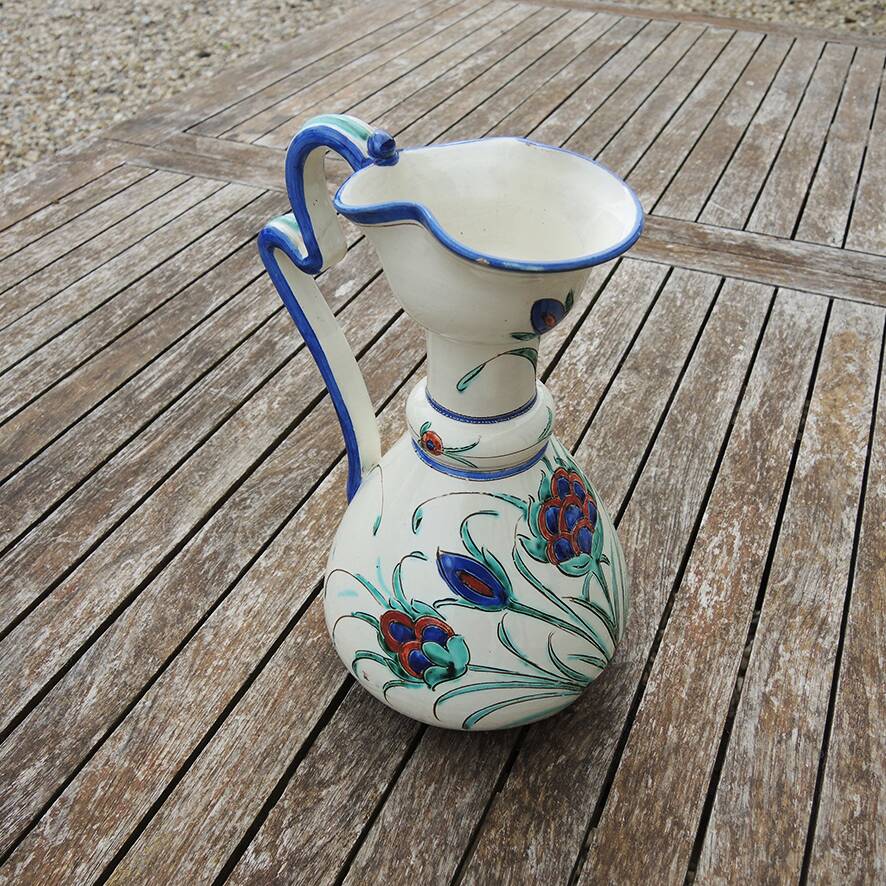 Antique Italian ceramic jug with floral decoration