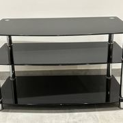 Modern chest of drawers with stainless steel and smoked glass