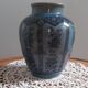 Decorative vase in blue glazed ceramic with floral decoration and arabesques, circa 1930