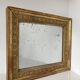 Petit miroir en bois stuqué et doré d’époque Restauration