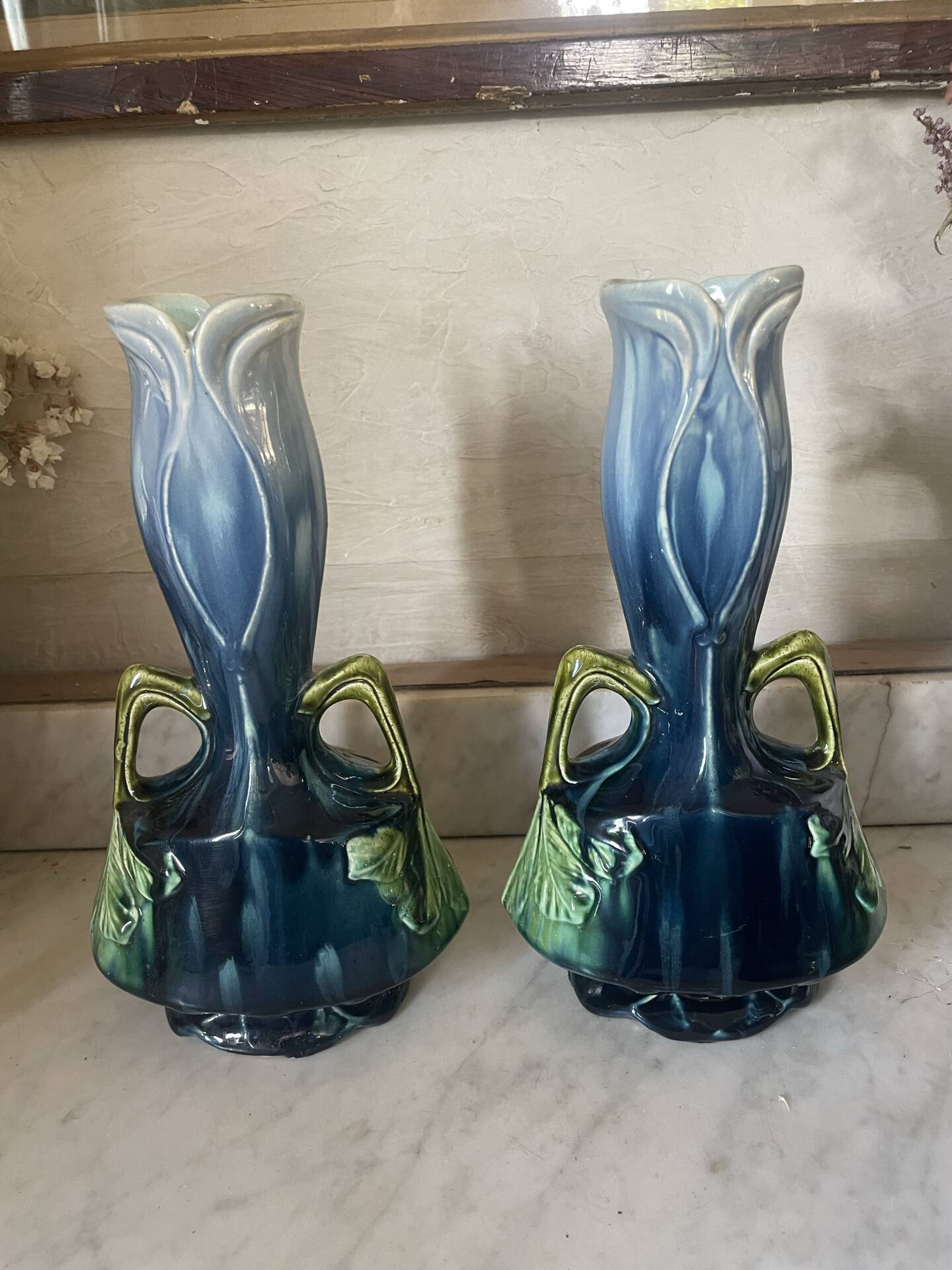 Pair of vases in slipware with Art Nouveau floral decoration.