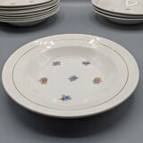 12 hollow porcelain plates, floral decoration and golden ledé - ∅: 23cm