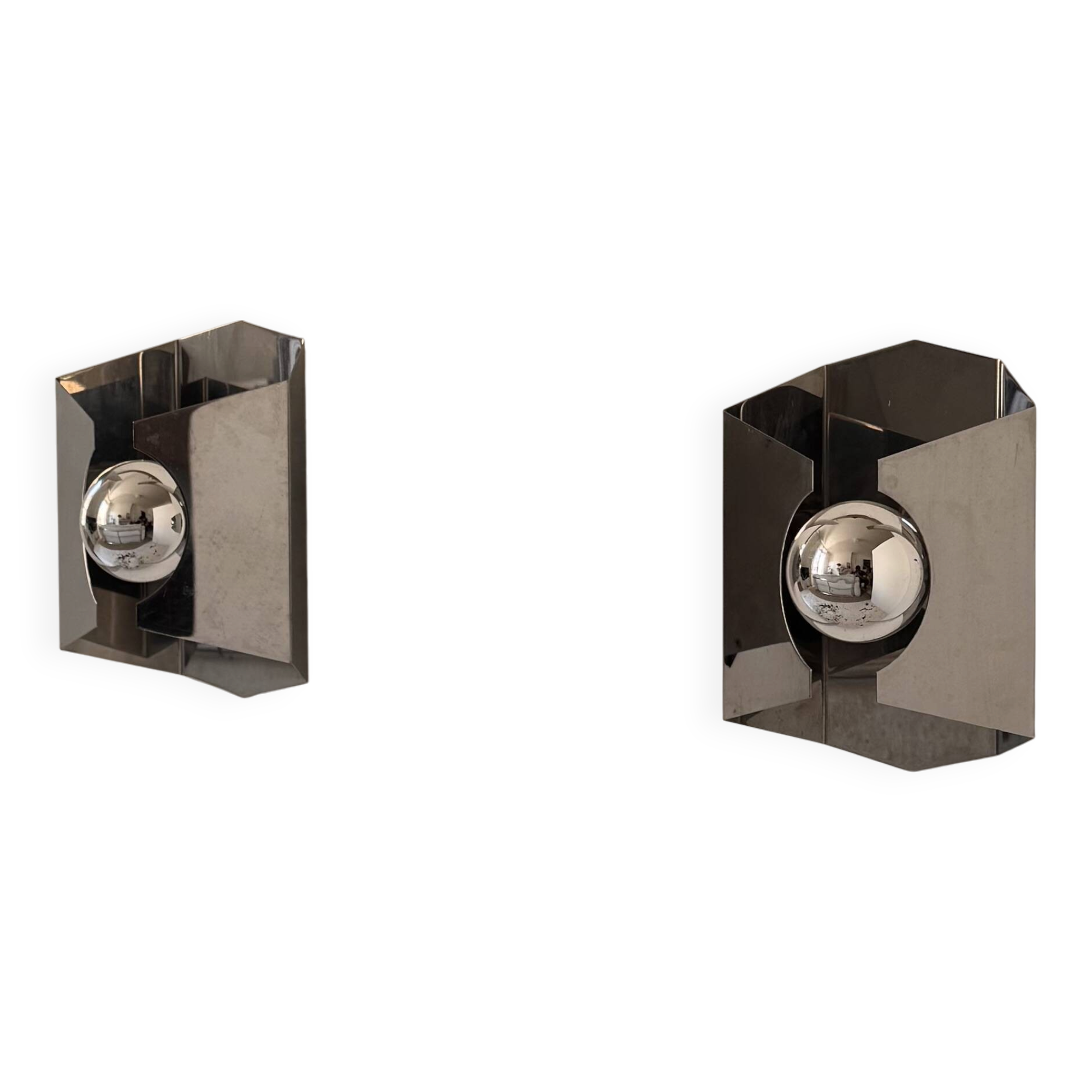 Pair of vintage geometric wall lights in chrome metal, France 1970.