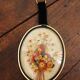Vintage medallion domed glass dried flowers black gold