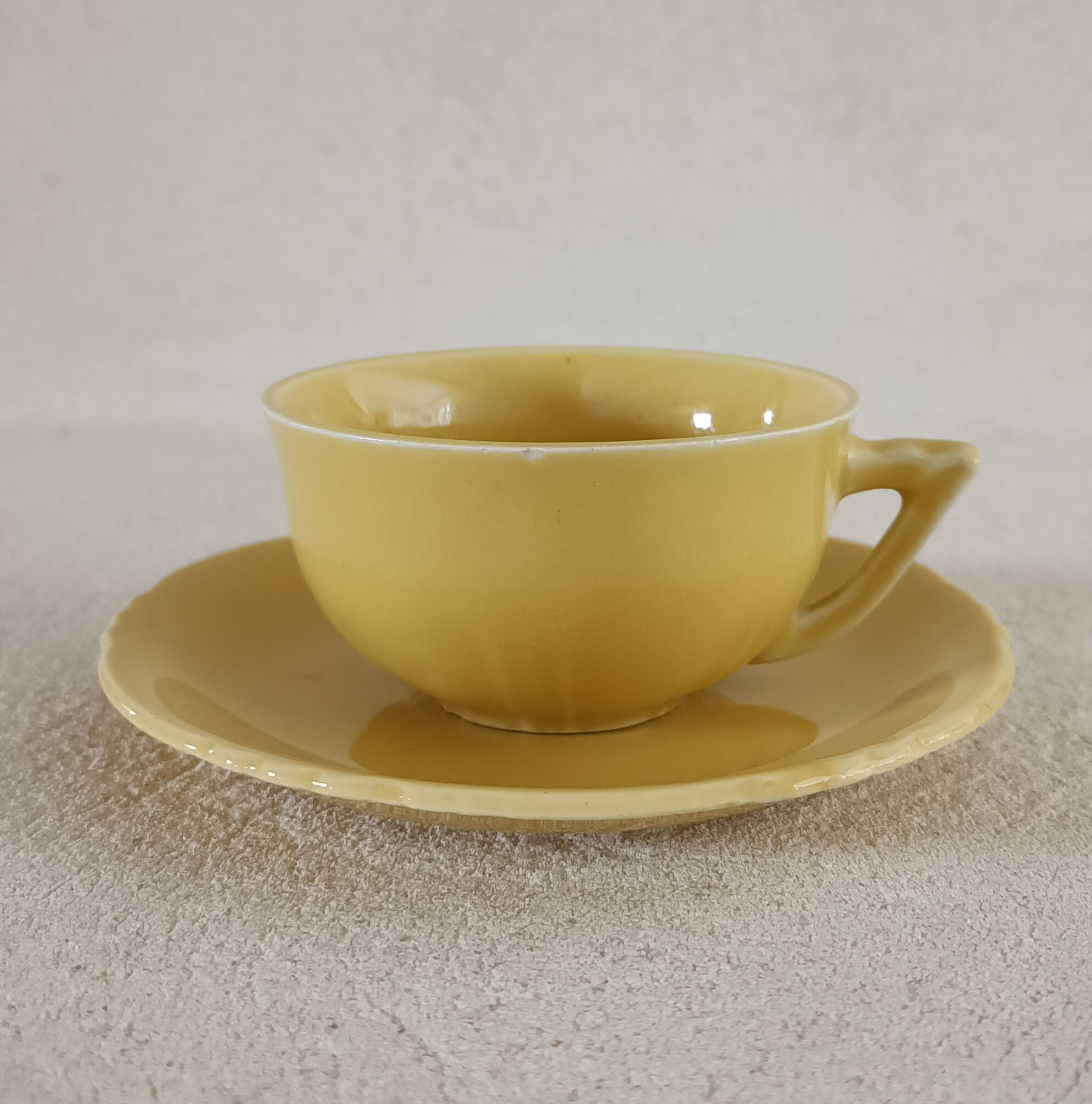 Earthenware cup and saucer 1940s-1950s