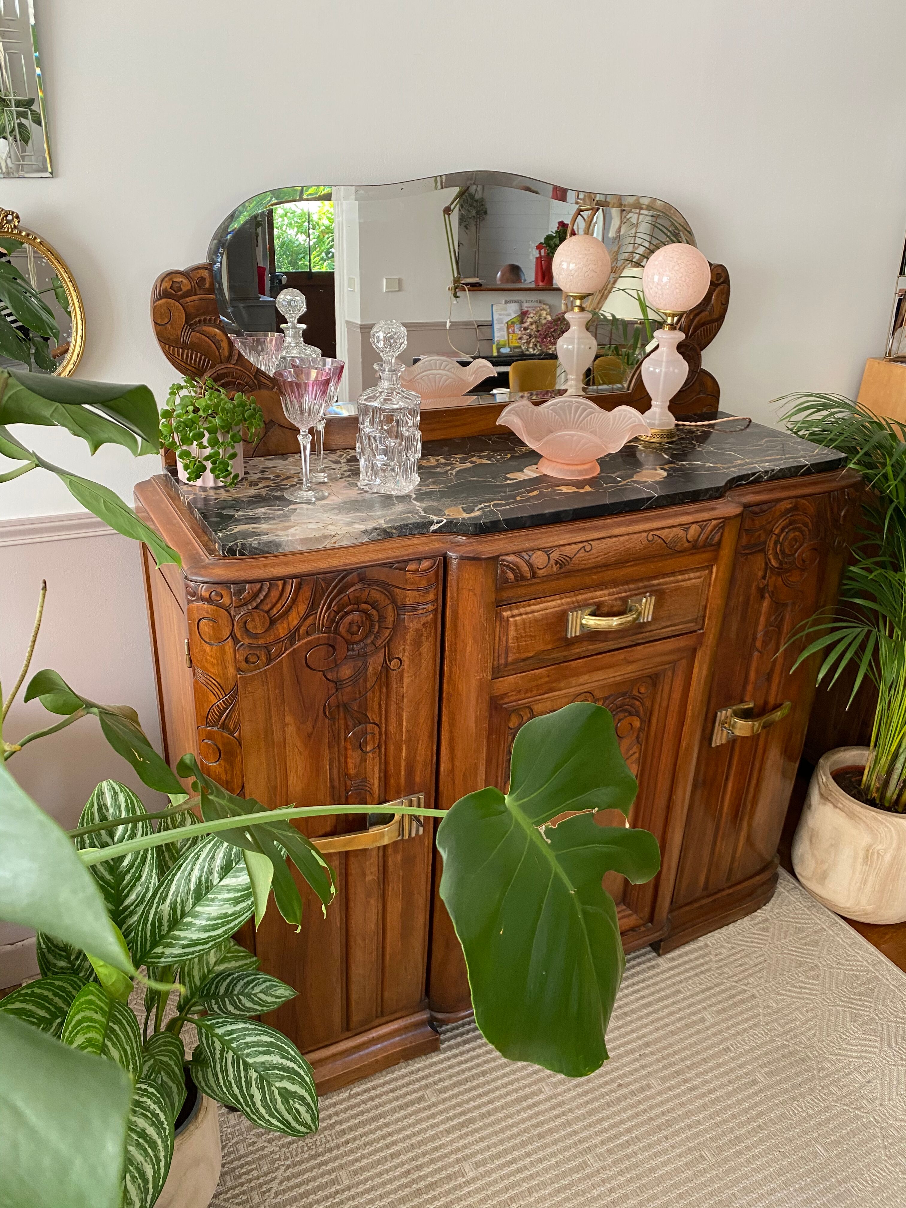 Art Deco black marble sideboard and vintage beveled mirror