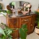 Art Deco black marble sideboard and vintage beveled mirror
