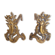 Pair of chimney tracks in bronze