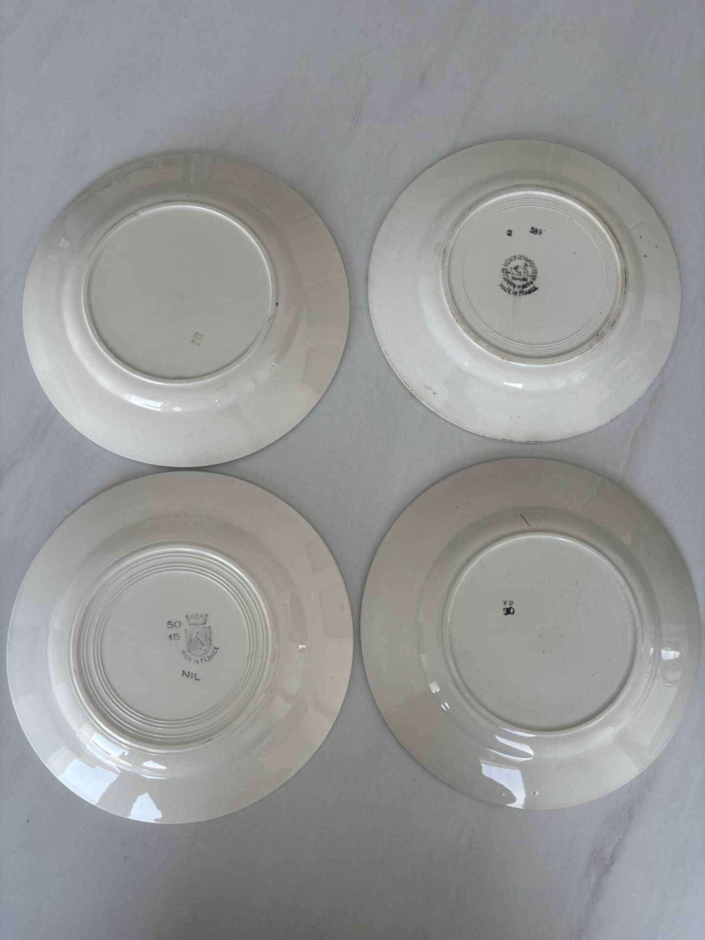 Lot of 4 antique earthenware plates from 1950, Saint Amand - plates bl