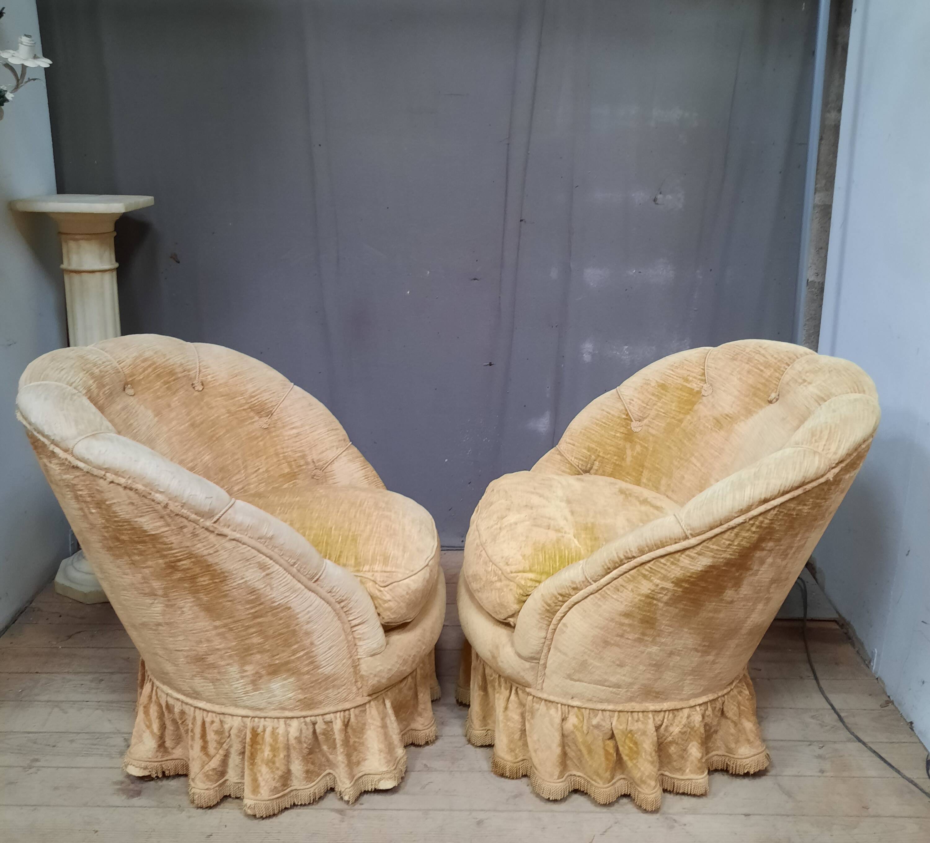 Pair of flared back toad armchairs