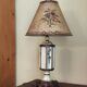 Large pagoda lamp painted with floral patterns and metal shade.