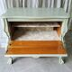 Commode galbée patinée