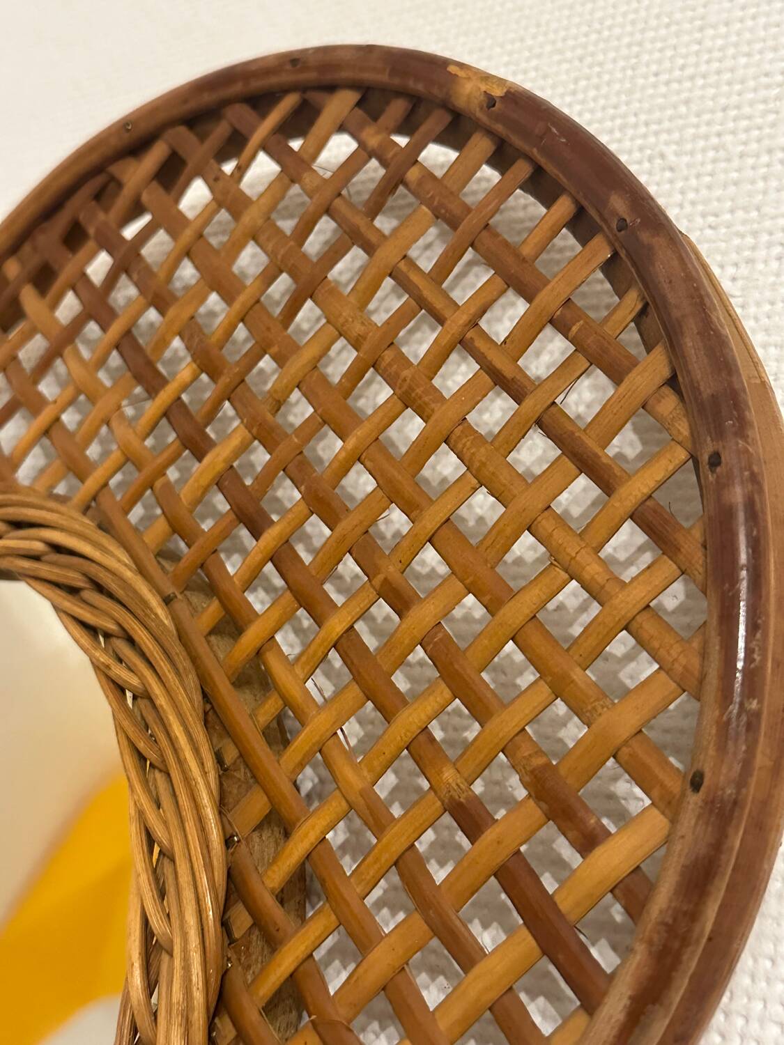 Vintage rattan tennis racket mirror