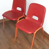 Pair of vintage red chairs