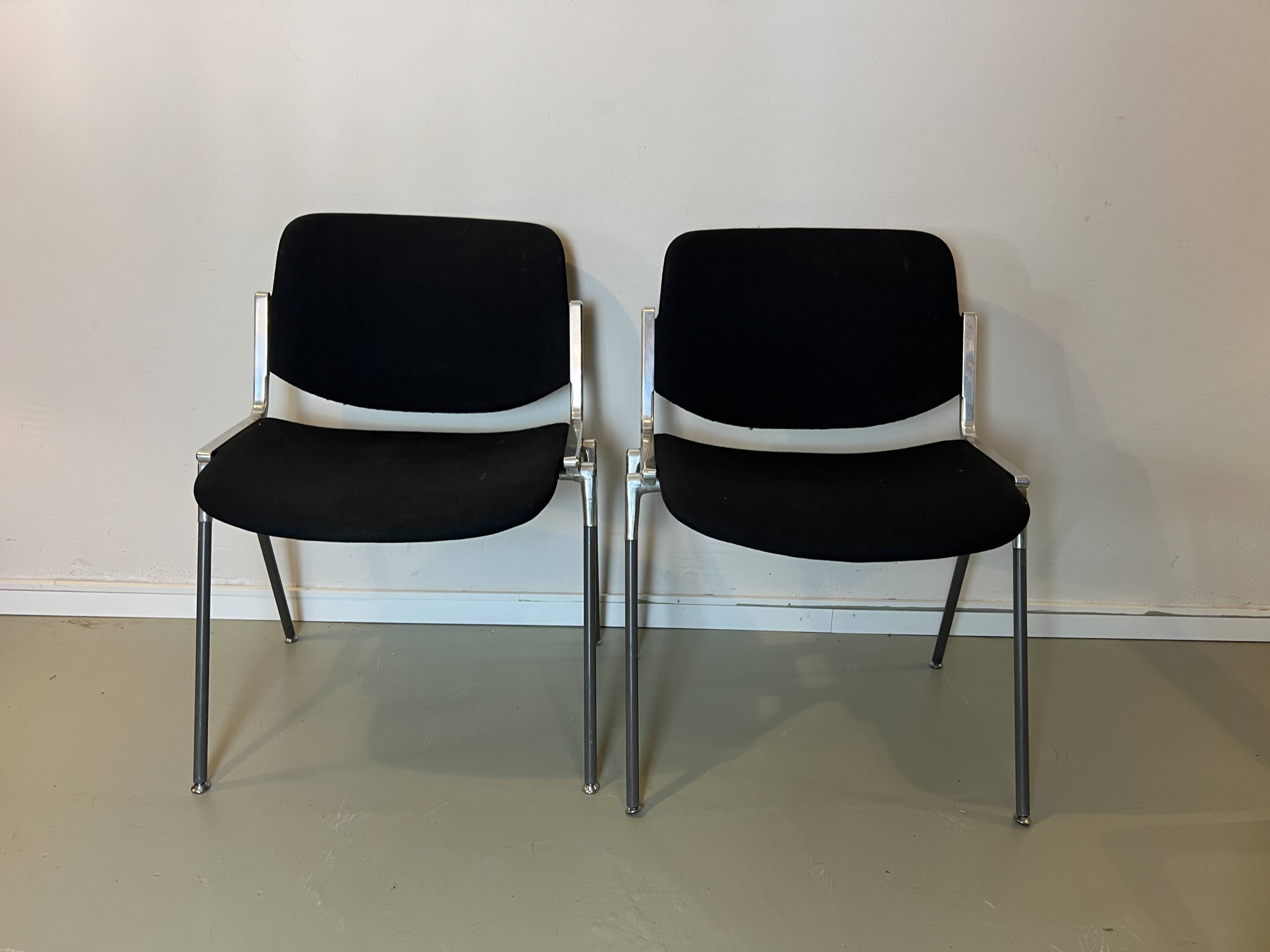 Black DSC chairs by Giancarlo Piretti for Castelli from the 60s/70s.