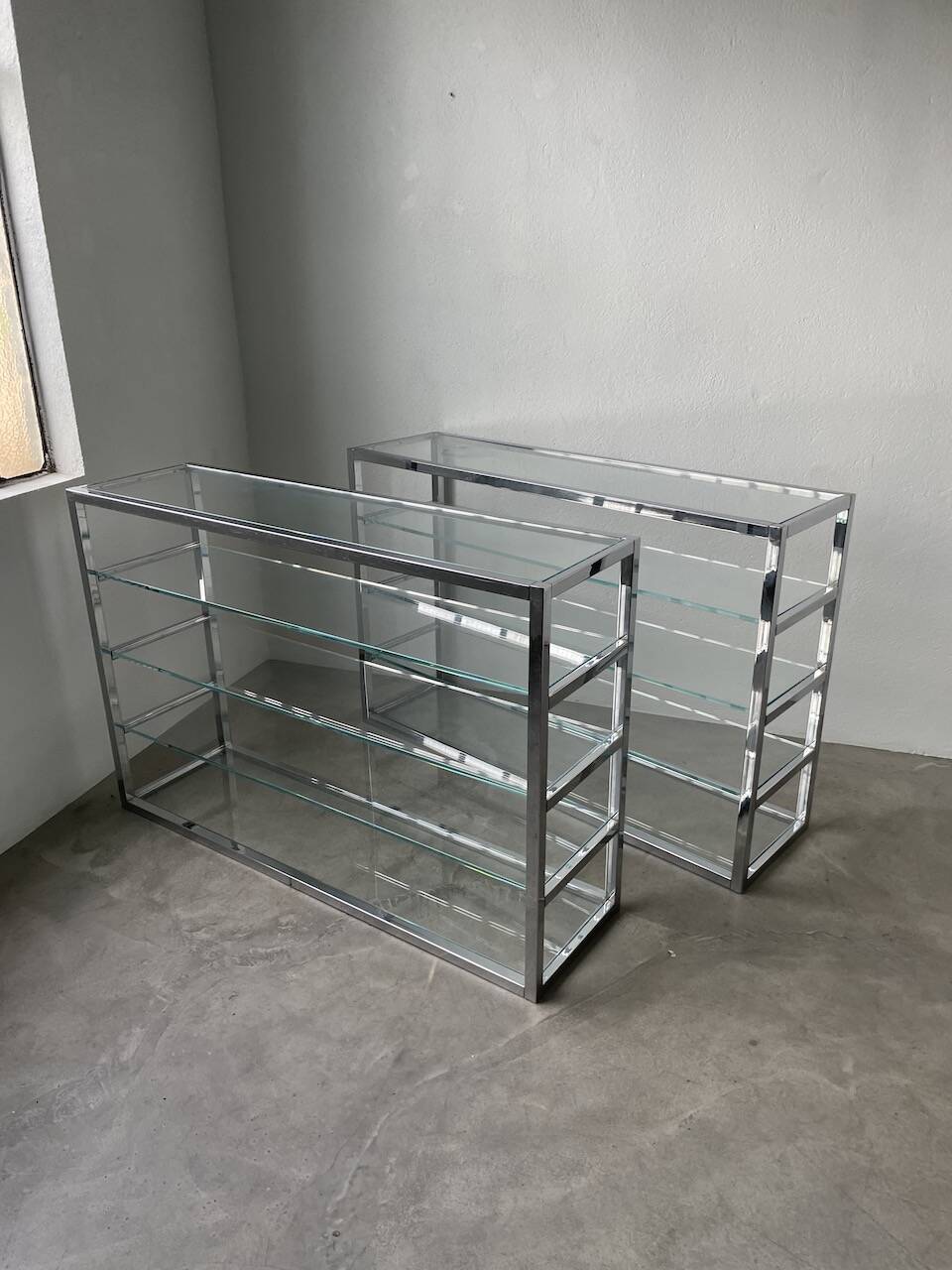 Pair of chrome and glass shelves from the 70s