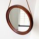 Mid Century solid teak wall mirror with a leather strap - Danish design