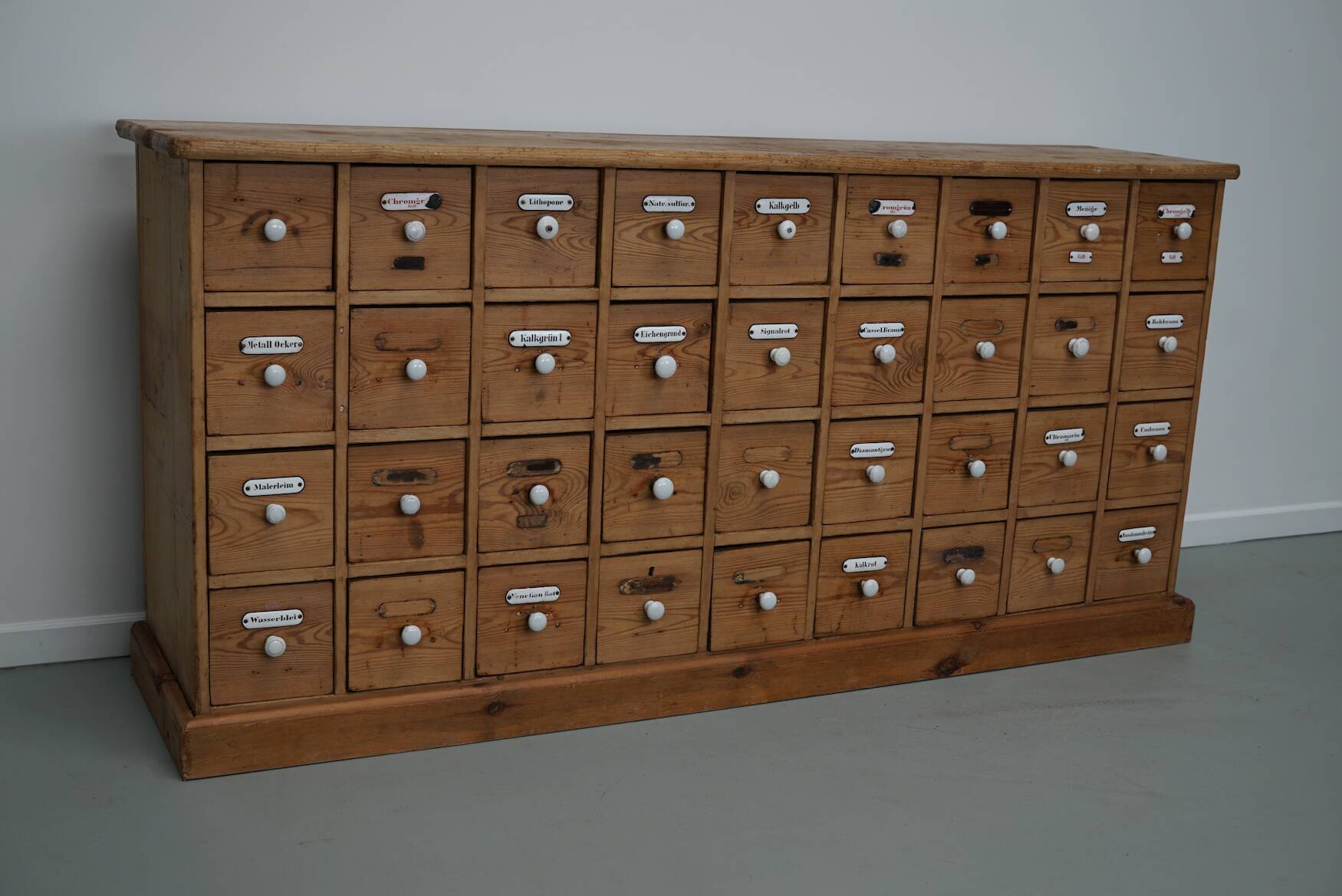 Antique German Pine Apothecary Cabinet with Enamel Shields, 1900s